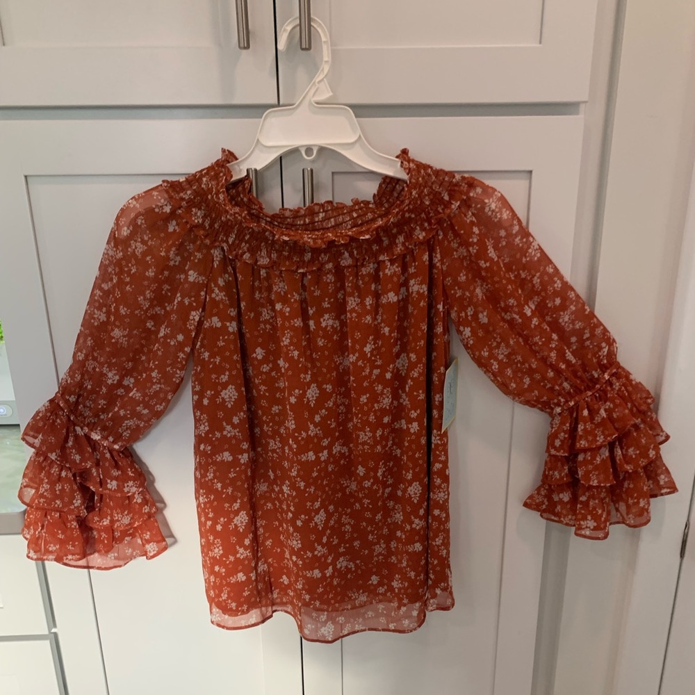 Cece burnt orange blouse with tags and never worn. Perfect condition.